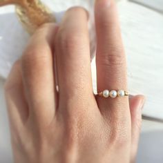 14k Gold Pearl Promise Ring, 14k Gold Pearl Ring For Promise, Adjustable Dainty Pearl Ring For Anniversary, Dainty Adjustable Pearl Ring For Anniversary, 14k Stamped Pearl Ring As Gift, Adjustable Tiny Wedding Ring, Dainty Pearl Toe Ring For Wedding, Adjustable Rose Gold Pearl Wedding Ring, Elegant 14k Stamped Midi Rings For Wedding