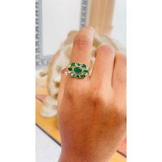 This is part of Chairish’s Fine Jewelry assortment.  Emerald ring in 14K Gold which perfectly goes with your personality and also helps you to improve your creativity. Designed with emeralds and diamonds that makes it a perfect fit to wear it on your wedding, occasions or style it with any of your basic outfit to give it a glam. This gorgeous ring is a great bridesmaid, wedding or christmas gift for anyone on your list.  PRODUCT DETAILS :-  Material - 14K Solid Yellow Gold Gemstone - Emerald Gem Green Multi-stone Emerald Ring Fine Jewelry, Fine Jewelry Green Multi-stone Emerald Ring, Multi-stone Emerald Diamond Ring For May Birthstone, Multi-stone Round Cut Emerald Ring, Emerald Multi-stone Round Cut Ring, Round Cut Multi-stone Emerald Ring, Green Multi-stone Emerald Rings, Diamond Multi-stone Emerald Ring For May Birthstone, Green Multi-stone Sapphire Diamond Ring