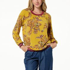 IMAN Global Chic Runway Jersey Printed Top with Ribbed Trim Make a grand entrance — or exit — in this head-turning raglan-sleeve top. With the bold print and contrasting ribbed trim, it's not something you see everyday. Fall Yellow Crew Neck Blouse, Raglan Sleeve Top, Chiffon Fashion, Grand Entrance, Draped Fabric, Bold Prints, Paisley Print, Color Choices, Raglan Sleeve