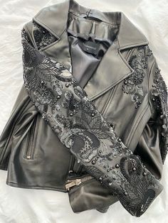 Norr Hammour  Sophia Zip-Front Lambskin Leather Jacket w/ Studded Embroidered Sleeves Size 40 Sold out everywhere!  100% authentic!  Purchased in Neiman Marcus  Retail: $1150 Amazing cropped leather jacket In immediate condition The leather on this is like butter -so soft! Sleeve: 23" Chest when zipper 18: Shoulder to hem: 19" Amazing accentuated zippers Sold as you see in photos This will ship wish signature and insurance  Gentle signs of wear means any and all flaws are mentioned in the listin Luxury Embellished Winter Outerwear, Designer Leather Jacket For Party, Winter Embellished Long Sleeve Biker Jacket, Embellished Long Sleeve Biker Jacket For Winter, Designer Embroidered Outerwear For Party, Fitted Long Sleeve Embellished Leather Jacket, Fitted Embellished Leather Jacket With Long Sleeves, Embellished Fitted Leather Jacket With Long Sleeves, Embellished Long Sleeve Biker Jacket For Fall