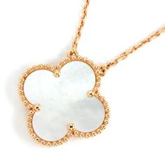 Elevate your style with our sleek and elegant Clover Pendant White MOP Necklace. Made with high-quality white Mother of Pearl, this necklace features a charming clover pendant design. Perfect for any occasion, this necklace adds a touch of sophistication to any outfit. Embrace the beauty and significance of the clover symbol with this stunning piece. ADDITIONAL INFORMATION Color: Gold, Pink Gold Stone: White Mother of pearl Ref. H1213 Material:- 925 Sterling Silver - 18k Gold Plated- 18k Real Go Luxury White Flower Pendant Jewelry, Luxury White Gold Flower Shaped Necklace, Luxury White Flower-shaped Necklaces, Luxury White Flower Shaped Necklace, Luxury White Flower Shape Necklace, Luxury White Flower-shaped Necklace, White Luxury Necklace With Delicate Chain, Luxury White Necklace With Delicate Chain, White Flower Pendant Necklace In Fine Jewelry Style