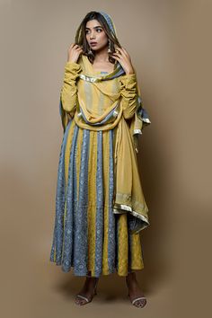 DETAILS: Long padded Anarkali kurta curated in two beautiful colours Plain Yellow colour palazzo Dupatta: Yellow dupatta with chikankari fabric border details and lace details. Neckline: off shoulder Sleeves: churidar sleeves Size and fit Kurta length: 50 inch Palazzo length: 36 inch Dupatta: 2.5 m Model Size: Model is wearing XXS Size Model Height: 5’6” Heels: 4 inches Fabric, colour and care Kurta Fabric: Heavy Chikankari on pure viscose georgette Sharara fabric: Cotton silk Colour: Yellow and Pista Green Anarkali Set With Chikankari Embroidery, Sheer Dupatta Anarkali Set In Mulmul, Pista Green Floor-length Anarkali Set With Chikankari Embroidery, Festive Pista Green Anarkali Set In Mulmul, Festive Pista Green Mulmul Anarkali Set, Yellow Mulmul Anarkali Set For Eid, Yellow Anarkali Set In Mulmul For Eid, Yellow Anarkali Set With Straight Kurta, Anarkali Pista Green Mulmul Sharara