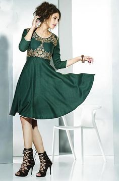 Our new winter collection features bottle green pashmina kurti beautifully portraying embroidery that gives a traditional touch to the outfit. This unique design is a perfect ensemble for winter, not only keeping you warm but also making sure you look stylish and trendy all the time. Available as stitched (ready-to-wear). Length: 39" Note: There might be a slight color variation due to lighting and flash used during photoshoot. The bright shade seen is the best closer view of fabric's color. Winter Kurta With Intricate Embroidery, Unstitched Resham Embroidery Kurta For Fall, Elegant Kurta With Zari Work For Fall, Traditional Green Fall Dresses, Traditional Green Kurta For Fall, Green Embroidered Kurta For Winter, Winter Green Embroidered Kurta, Green Embroidered Winter Kurta, Winter Embroidered Green Kurta