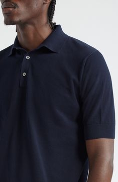 Cut from lightweight and cooling cotton air crepe, this comfortable polo makes a great pick for warm-weather months. Button half placket Spread collar Short sleeves Ribbed cuffs and hem 100% cotton Machine wash, dry flat Made in Italy Designer Clothing Cotton Polo Sweater With Button Closure And Relaxed Fit, Classic Navy Polo Shirt With Placket, Classic Navy Polo Shirt With Placket Detail, Classic Navy Polo Shirt, Classic Polo Collar Sweater For Summer, Classic Polo Collar Summer Sweater, Classic Summer Polo Sweater With Ribbed Collar, Classic Summer Polo Sweater, Classic Navy Fitted Polo Sweater