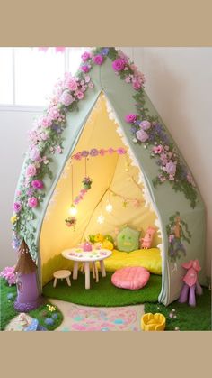 Step into a world of magic with our fairy garden-themed design ideas for a toddler girl's bedroom. Learn how to incorporate flower-shaped rugs, fairy lights, and a mini playhouse or tent adorned with flower garlands and fairy decorations to create an enchanting and imaginative space for your little one to explore. Fairy Themed Playroom, Fairy Tent Diy, Flower Fairy Bedroom, Flower Garden Nursery Theme, Enchanted Forest Girls Bedroom, Magical Girls Bedroom, Fairy Toddler Bedroom, Fairy Garden Bedroom Ideas Kids Rooms, Girls Room Theme Ideas