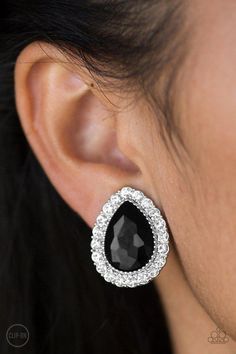 Glassy white rhinestones spin around a faceted black teardrop gem for a regal look. Earring attaches to a standard clip-on fitting. Sold as one pair of clip-on earrings. Mixed Metal Jewelry, Paparazzi Accessories, White Rhinestone, Black Earrings, Paparazzi Jewelry, Affordable Jewelry, Trendy Accessories, Accessories Earrings, Fashion Earrings