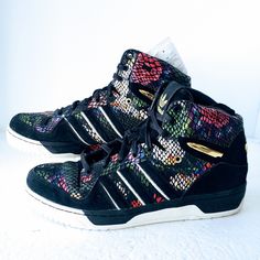 This is an authentic and rare pair of adidas Attitude Hi Big Sean sneakers in size 14. The shoes are new and have never been worn, but do not come with the original box. The colorful design features a mix of blue, orange, yellow, and green, with the recognizable adidas stripes on the side. These high-top sneakers are perfect for athletic activities or as a stylish addition to any casual outfit. The shoe shaft style is a standout feature, while the department is listed as men's shoes. The product Adidas Lace-up High-top Sneakers For Streetwear, Multicolor High-top Sneakers With Laces, Adidas Multicolor Lace-up Basketball Shoes, Urban Multicolor Skate Shoes For Streetwear, Multicolor Synthetic Sneakers With Speckled Midsole, Multicolor Lace-up High-top Sneakers For Sports, Multicolor Sneakers With Boost Midsole For Streetwear, Multicolor Boost Sneakers For Streetwear, Multicolor High-top Skate Shoes For Streetwear