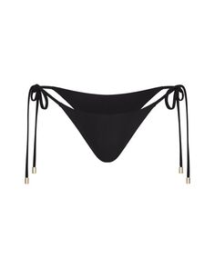 Elevate your swim look with our Black Ambra Bottoms. The elegant side tie bikini bottom features refined strings with gold embellishments. The Brazilian cut in shiny double-lined black fabric can be worn low or high waisted. Pair it with our Black Ambra or Firenze Top for a coordinated look, or add some flair with the matching lustrous Sorrento Sarong. Gold Tie-side Bottoms For Beachwear, Black String Tie Swimwear For Beach, Gold Tie-side Bottoms For Summer, Elegant Tie-side Bottom Swimwear For Pool, Elegant Tie-side Swimwear For Beach Season, Elegant String Beach Bottoms, Elegant String Swimwear For Summer, Elegant Beach String Bottoms, Black Tie-side Swimwear With Side Ties