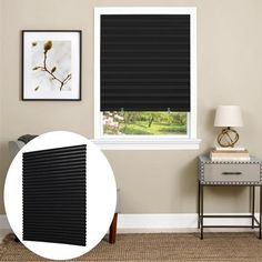 a living room with a window covered in blinds and a side table next to it