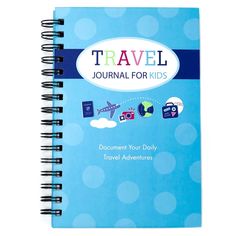 a travel journal with blue cover and white polka dots on the front, has an airplane flying over it