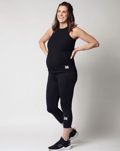 Power Ribbed Black Tank, Designed For A Four Way Stretch. Functional Sleeveless Activewear In Elastane, Functional Sleeveless Elastane Activewear, Ribbed High Stretch Sleeveless Activewear, Ribbed Sleeveless Gym Activewear, Fitted High Neck Tank Top For Workout, Solid Stretch High Neck Activewear, Sleeveless Ribbed Workout Activewear, Solid Color Stretch High Neck Activewear, Solid High Neck Stretch Activewear