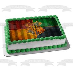 a cake decorated with the flag of hogwarts and a gryffin on it