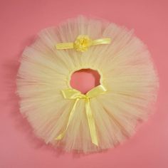 This tutu skirt is a perfect party costume for your little princess. The tutu skirt is soft and comfortable to wear. It is easy to put on or take off and looks adorable with any outfit! Your little one will love playing dress-up in this authentic tulle skirt with a matching headband. Material: Polyester, Tulle Summer Ballet Tutu Dress For Dress-up, Cute Tulle Skirt, Cute Yellow Tutu Dress For Party, Cute Yellow Tutu Dress For Dress-up, Princess Tulle Tutu Dress For First Birthday, Princess Style Tulle Tutu Dress For First Birthday, Spring Balletcore Tulle Tutu Dress, Yellow Tulle Skirt Tutu Dress For Party, Tulle Tutu Dress For Cake Smash