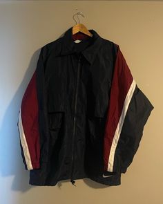 Vintage Nike windbreaker  - 90s vintage  - White tag  - Big swoosh back logo  - Bottom hemline swoosh front logo  - Striped sleeve  - Vented all around  Size: XL  Great vintage condition  No rips or holes  No stains Cheap Retro Windbreaker For Sports, Nike Windbreaker Outfit, Windbreaker Outfit, Nike Noir, Vintage Nike Jacket, Nike Windbreaker Jacket, Vintage Nike Windbreaker, Nike Vintage, Nike Windbreaker