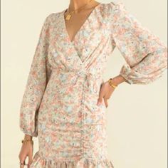 This Beautiful Floral Dress Is A Classic Sundae Muse Dress That Cinches Perfectly At The Waist. It Is In A Au Size 10 Which Fits A Us Size 4-6. In Perfect Condition, Never Worn. Spring V-neck Ruched Dress, Spring V-neck Dress With Ruched Details, Feminine Ruched Floral Dress For Brunch, Pink Ruched Knee-length Dress, Ruched Floral Dress For Spring Brunch, Spring Floral Dress With Ruched Detail For Brunch, Long Sleeve Ruched Summer Dress, Pink Ruched Floral Dress For Spring, Pink Floral Mini Dress With Ruffle Hem