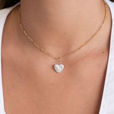 Our newest long & short chain paired with a delicate mother of pearl heart or flower charm. Perfect to gift or wear. Long & short chain made with 14k gold fill. Available with a 16 or 18 inch chain and secure spring ring clasp. Layer up with your other fave chains or wear solo as the perfect everyday necklace. Every Jewel Ya design arrives in our signature acrylic container for storage and safekeeping. Contact us with any questions – we’re here to help. Delicate Heart Necklace With Pearl Charm, Everyday Heart-shaped Necklace With Pearl Charm, Heart-shaped Pearl Charm Necklaces For Gifts, Delicate Heart-shaped Pearl Charm Necklace, Layering Chains, Valentine's Day Heart-shaped Pearl Charm Necklace, Acrylic Containers, Flower Charm Necklace, Pearl Heart