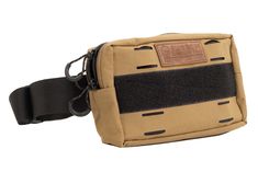 a tan and black waist bag on a white background