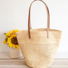 Elena Handbags Women's Large Soft Raffia Woven Summer Straw Tote Straw Bucket Bag For Daily Use, Daily Use Straw Bucket Bag, Daily Use Straw Bag In Bucket Shape, Daily Use Straw Bucket Bags, Chic Straw Basket Bag With Rolled Handles, Chic Basket Straw Bag With Rolled Handles, Everyday Summer Bucket Bag With Rolled Handles, Summer Everyday Bucket Bag With Rolled Handles, Chic Natural Bucket Bag With Rolled Handles