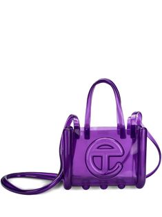 purple semi-sheer construction embossed logo to the front two top handles single shoulder strap open top main compartment unlined Trendy Purple Bag With Dust Bag Included, Modern Purple Bag With Detachable Strap, Purple Rectangular Bags With Adjustable Handle, Trendy Purple Bag With Top Carry Handle, Trendy Purple Satchel With Top Carry Handle, Trendy Top Handle Shoulder Bag With Logo, Trendy Rectangular Shoulder Bag With Logo, Modern Purple Shoulder Bag, Modern Purple Rectangular Satchel