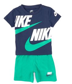 From Nike, this two-piece set features:Solid jersey t-shirt with crew necklineshort sleeves (one with "Nike" logo and "Swoosh" design trademark)wraparound "Nike" and "Swoosh" design trademark designs pullover constructionSolid shorts with elastic waist pull-on construction"Nike" logo and "Swoosh" design trademark on one legJersey t-shirt of cotton/polyester; shorts of tricot polyesterMac Green Short Sleeve Sets With Letter Print, Green Short Sleeve Set With Letter Print, Sporty Letter Print Sets For Spring, Spring Sporty Sets With Letter Print, Spring Sporty Letter Print Sets, Sports Sets With Graphic Print And Short Sleeves, Cotton Sports Sets With Short Sleeves, Cotton Sport Sets With Graphic Print, Short Sleeve Cotton Sports Set