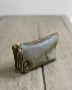 The perfect pouch to keep you organized. Your toiletries, makeup, electronics, or pens/pencils have found their new home. Material: Genuine Glovetan leather, durable nylon thread Our leather goods are made by hand, please allow up to 5 business days for production before shipment. Handmade by Crossbow in the mountains of Telluride, CO.