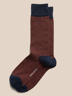 A soft sock in a breathable stretch-cotton blend with rib-knit openings and angled toe seams for a better, more comfortable fit.  Fits men's shoe sizes 8-12. Comfortable Cotton Socks For Fall, Casual Striped Stretch Socks, Casual Stretch Striped Socks, Fitted Red Cotton Socks, Comfortable Cotton No-show Socks, Comfortable No-show Cotton Socks, Comfortable Ribbed Casual Socks, Comfortable Casual Ribbed Socks, Casual No-show Fitted Socks