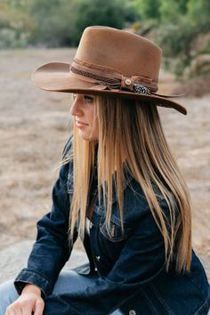 The Peter Grimm Unstoppable is made from 100% Wool Felt hat An artisan drifter, unisex style with a 3.25" brim. Finished with a distressed handcrafted ribbon band with feather and Peter Grimm pin Multiple size options available Country Style Hat With Distressed Brown Short Brim, Distressed Brown Rodeo Hat With Short Brim, Distressed Brown Short Brim Hat For Rodeo, Distressed Brown Fedora For Country Events, Country Style Distressed Brown Fedora Hat, Adjustable Distressed Brown Country Hat, Rustic Distressed Brown Brimmed Hat, Distressed Brown Brimmed Hat For Western-themed Events, Distressed Brown Hat With Short Brim For Western Events