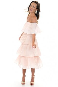 Tiered Pleats Dress, Blush Flowy Tiered Pleated Midi Dress, Flowy Tiered Dress With Pleats, Chic Pleated Tiered Summer Dress, Chic Pleated Tiered Dress For Summer, Pleated Tiered Midi Dress For Brunch, Strapless Midi Dress With Ruffles For Casual Wear, Spring Off Shoulder Midi Dress With Ruffles, Spring Midi Off Shoulder Dress With Ruffles, Flowy Layered Tiered Skirt Dress