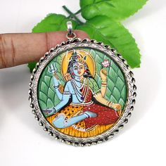 925 sterling silver Handmade and Hand-painted lord shiva pendant Goddess Parvati Pendant, Indian jewelry, tribal jewelry, Shiva pendant Description : Metal : 925 Sterling Silver Weight : 19.40 Gram Approx Handmade Item **Made To Order** Glass Framed God Ganesha Painting For more silver jewelry designs please visit our store : https://www.etsy.com/shop/BijouxMaison Shiva Pendant, Goddess Parvati, Ganesha Painting, Silver Jewelry Design, Labradorite Earrings, Lord Shiva, Opal Jewelry, Handmade Pendants, Ganesha