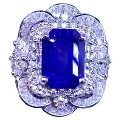 An exquisite Art Deco style for this elegant ring in 18k gold , so chic and refined, with a Ceylon blu royal color sapphire , extra fine quality, of 5,58 carats and round and baguettes cut diamonds of 1,63 carats, F/VS . Handcrafted by artisan goldsmith. Excellent manufacture and quality. Complete with AIG report. Whosale price. Note: on my shipment, customers not pay taxes and duty. Royal Colors, Ceylon Sapphire, Baguette Cut Diamond, Elegant Ring, Dream Jewelry, Art Deco Style, Sapphire Diamond, Deco Style, Cocktail Rings