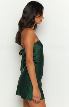 * Green Mini Dress 
 * 
 
 * HOW TO STYLE: 
 * We cannot take out eyes off this chic strapless mini dress ()! This style and colour is perfect for your formal or homecoming () event. Elevate with heels and gold jewellery ()! 
 * 
 
 * FEATURES: 
 * Lightweight 
 * Mini length 
 * Bias cut 
 * Slight stretch 
 * Invisible zip on left side 
 * Ribbon tie-up back 
 * Low detailing at back  
 * Lined Dark Green Strapless Mini Dress, Mini Dresses For Homecoming, Formal Green Dress Short, Gala Mini Dress, Green Formal Mini Dress, Forest Green Mini Dress, Hoco Dresses Emerald Green, Forest Green Short Dress, Hoco Dresses Dark Green