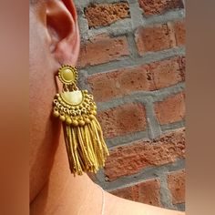 These Are Unique And So Boho Metal With Beautiful Rayon Tassels Abstract Boho Style They Hang 3 Inches Not Too Big Or Heavy These Are Very Lightweight On The Ear Beautiful Color Easy To Wear They Are One Of A Kind These Earrings Are A Classic And Natural Addition To Any Wardrobe Adjustable Gold Bohemian Tassel Earrings, Yellow Fringe Jewelry For Party, Gold Tassel Earrings For Festivals, Gold Elegant Tassel Earrings For Festival, Elegant Gold Tassel Earrings For Festival, Summer Gold Tassel Earrings, Gold Tassel Jewelry For Summer, Summer Gold Tassel Jewelry, Gold Earrings With Latkans For Summer