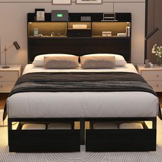 a bed with two nightstands on each side and a night stand in the middle