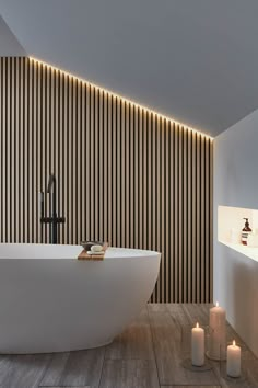 Natural Oak and Black SlatWall Waterproof on wall behind contemporary white bath. Waterproof Wall Panels, Bathroom Wall Panels, Wall Panels Bedroom, How To Waterproof Wood, Wood Cladding, Decorative Wall Panels, Bathroom Trends, Slat Wall