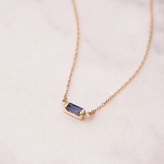 14K 18K Solid Gold Solitaire Baguette Sapphire Necklace, Genuine Sapphire Baguette Gold Necklace, Blue Sapphire Necklace, Material: Solid Gold (Not Gold Filled or Gold Plated) Karat: 14K or 18K (real gold) Available gold color: Yellow, Rose, and White Stone : Genuine Sapphire (Not lab created) You can order this dainty baguette sapphire necklace with one of the blue sapphire, pink sapphire, green sapphire, orange sapphire or yellow sapphire stone options. You can customize your chain length and Sapphire Necklace With Baguette Cut For Gifts, Sapphire Necklace Baguette Cut For Gift, Sapphire Baguette Cut Necklace For Gift, Blue Baguette Cut Necklaces For Gifts, Baguette Necklace, Blue Sapphire Necklace, Red Sapphire, 16 Inch Necklace, Solid Gold Necklace