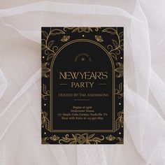 a black and gold new year's party card