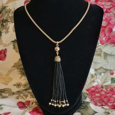 Brand New In Original Box Long Goldtone Black Tassel Nekclace Goes With Almost Everything Casual And Elegant 18 To 19 In. Long. Gold Tassel Dangle Necklace Gift, Gold Beaded Tassel Necklace Gift, Lariat Tassel Necklace With Adjustable Chain As Gift, Elegant Tassel Necklace With Adjustable Chain As Gift, Adjustable Lariat Tassel Necklace As A Gift, Long Lariat Necklace With Tassels As A Gift, Adjustable Gold Tassel Necklace For Party, Elegant Tassel Necklaces As Gift, Elegant Tassel Necklace As Gift