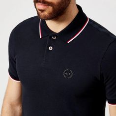 Men’s navy polo shirt from Armani Exchange. Crafted from woven piqué cotton, the polo shirt is detailed with contrast twin tipping on the ribbed polo collar and cuffs, a tonal ‘AX’ logo print on the left chest and a two-button placket. Complete with short sleeves, logo-engraved buttons and a straight hem with side slits..Main Fabric: 100% Cotton. Rib Details: 98% Cotton, 2% Elastane. Model is 188cm/6'2' and wears a size M. Ax Logo, Men Tips, Navy Polo Shirt, Armani Exchange Men, Polo Collar, Armani Exchange, Collar And Cuff, Polo Shirts, Button Placket