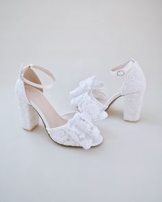 Fun and flirty block heel sandals in crochet lace with added an oversized crochet lace bow will create a dainty yet classic look to any occasions. An elegance and classic addition to your wedding look, bridesmaids, party, prom, date night, and any special occasions.DETAILS:HEELS: 3.75 inchesUPPER: Synthetic upper and liningMATERIALS: Manmade outsoleORIGIN: Imported Shoes For Brides, Bridesmaids Party, Prom Date, Wedding Look, Block Heel Sandals, Mary Jane Heels, Lace Bows, Bride Shoes, Boot Pumps