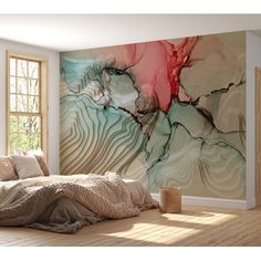 a bedroom with a large painting on the wall