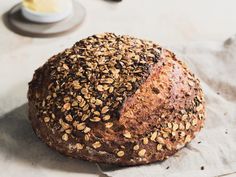 a loaf of bread sitting on top of a piece of paper