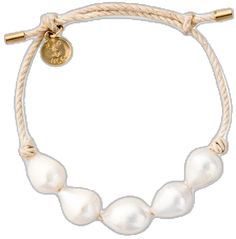 a white bracelet with three pearls and a gold charm on it's end,