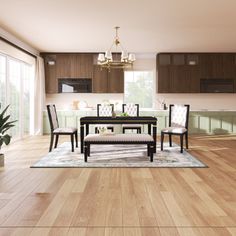 a dining room with wooden floors and cabinets