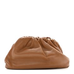 This is an authentic BOTTEGA VENETA Butter Calfskin The Pouch 20 in Cammello. This stylish clutch is crafted of calfskin leather in light brown. The bag features a ruched leather magnetic top that opens to a matching leather interior. Brown Smooth Grain Evening Bag, Brown Leather Pouch Clutch, Luxury Brown Soft Leather Clutch, Travel Clutch In Soft Brown Leather, Brown Soft Leather Clutch For Travel, Brown Clutch With Removable Pouch, Brown Leather Travel Clutch, Brown Leather Clutch For Travel, Brown Clutch With Dust Bag