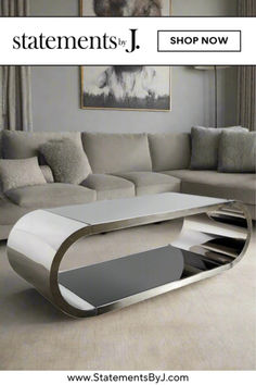 a white coffee table sitting in front of a couch