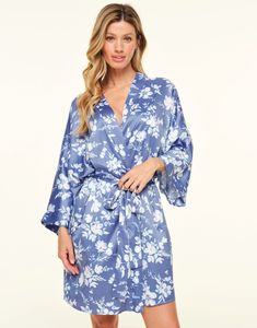 Our Izabella floral blue robe is made from soft recycled satin and features a beautiful pressed floral print. It's the perfect piece to throw over your sleepwear for a chic and romantic look. (Available in sizes XS-XL). Blue Floral Print Sleepwear, Blue Spring Robe For Loungewear, Floral Print Satin Sleepwear For Loungewear, Satin Floral Print Sleepwear, Blue Floral Print Robe For Vacation, Printed Blue Sleepwear For Spring, Blue Printed Sleepwear For Spring, Blue Floral Print Kimono For Loungewear, Feminine Floral Print Robe For Loungewear