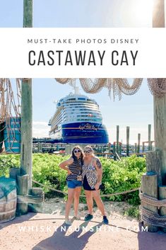 two women pose for a photo in front of the disney castaway cay