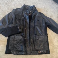 Vintage Authentic Diesel Mens Leather Jacket In New Without Tags Perfect Condition!! No Low Ball Offers Please Black Leather Jacket With Multiple Pockets For Fall, Black Biker Jacket With Multiple Pockets For Work, Masculine Black Leather Jacket For Work, Black Leather Sport Coat With Pockets, Casual Black Leather Jacket With Multiple Pockets, Casual Business Outerwear With Multiple Pockets, Black Leather Biker Jacket With Flap Pockets, Urban Leather Outerwear For Business, Black Leather Jacket With Flap Pockets For Business