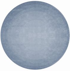 a round blue rug on a white background