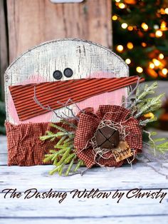 a close up of a snowman decoration on a table